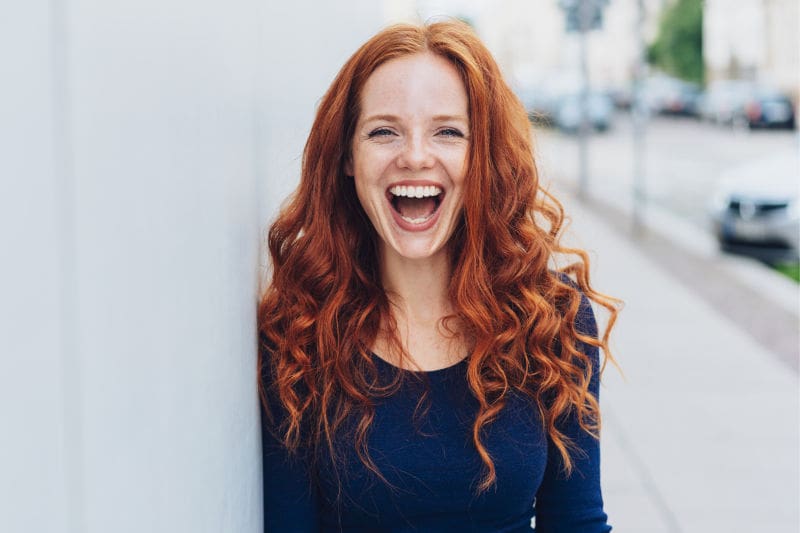 woman smiling | dental crowns worcester